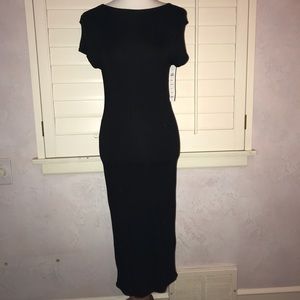 Calf length black dress. NWT stretch size medium